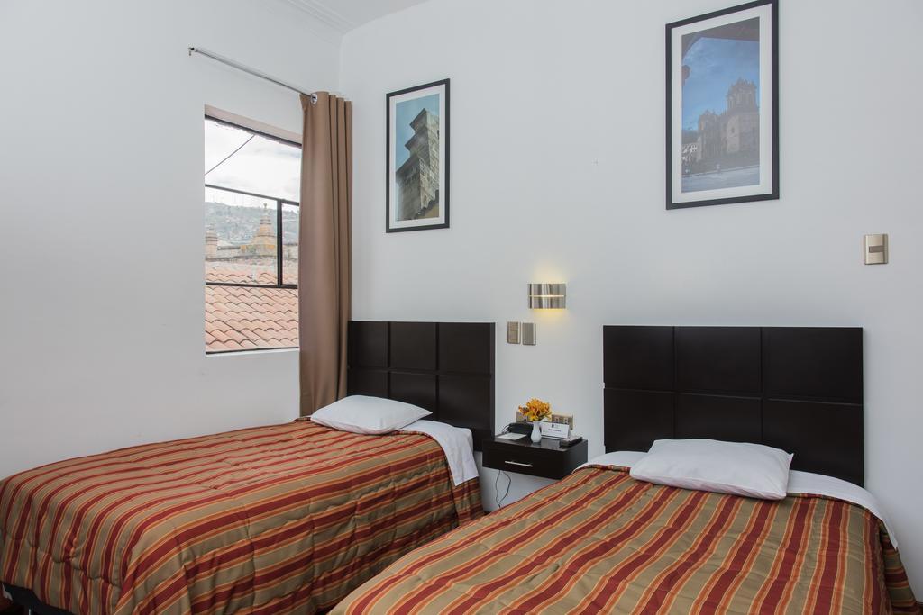 Hostal & Apartments El Triunfo Cusco Exterior photo