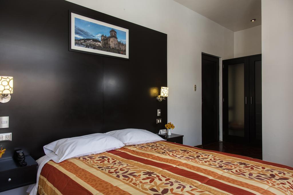 Hostal & Apartments El Triunfo Cusco Exterior photo