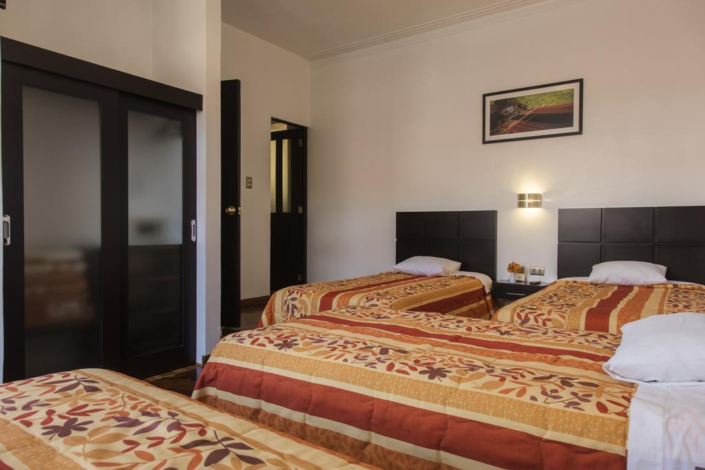 Hostal & Apartments El Triunfo Cusco Exterior photo