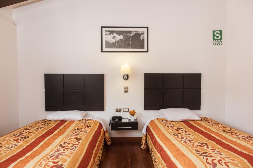 Hostal & Apartments El Triunfo Cusco Exterior photo